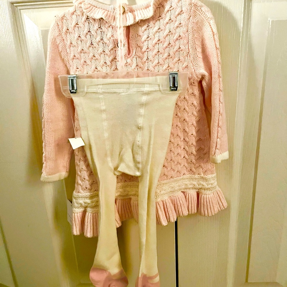 Pretty pink sweater dress with matching off white/ pink tights.  Brand new